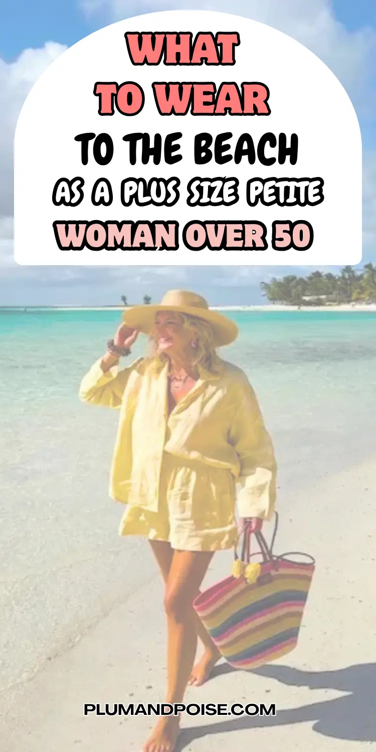 A woman walks barefoot along a turquoise shoreline in a bright yellow linen shirt and shorts cover-up, wide brim straw hat, and a striped straw tote. The look is a confident, sun-ready beach outfit for plus size petite women over 50, showing how a monochromatic summer set and vacation-ready accessories work together by proportion. Text overlay reads: What to Wear to the Beach as a Plus Size Petite Woman Over 50. Site: plumandpoise.com.